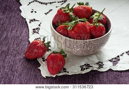 Ripe Strawberries In A Bowl On A Napkin. Delicious Breakfast.