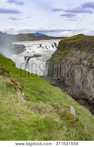A Scenic View Of The Hraunfossar Waterfalls, Located Near Husafell And Reykholt In West Iceland