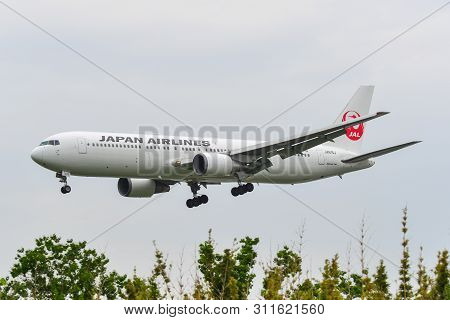 Passenger Airplane Landing At The Itami Airport