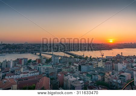 Aerial View Of Istanbul Suburbs At Sunset. Fatih, Beyoglu, And Balat Historic Suburbs Of Istanbul
