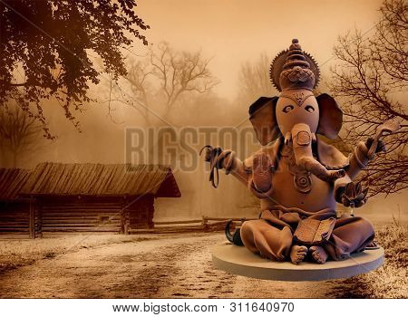 Ganesh Chaturthi Is Brown In Color Against Old Buildings And Trees. The Patron Of Arts And Sciences 