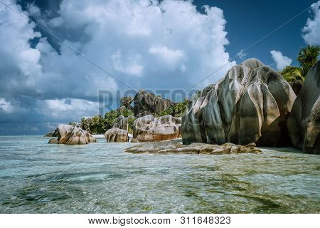Anse Source Dargent - Most Famous Paradise Tropical Beach. Bizarre Granite Rocks Against Beautiful W