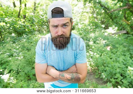 Style Designed For A Brutal. Bearded Man With Brutal Look Keeping Arms Crossed. Brutal Caucasian Guy