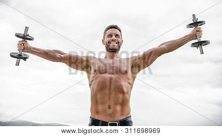 Man Sportsman Weightlifting. Steroids. Fitness And Sport Equipment. Success. Perfect Biceps. Athleti