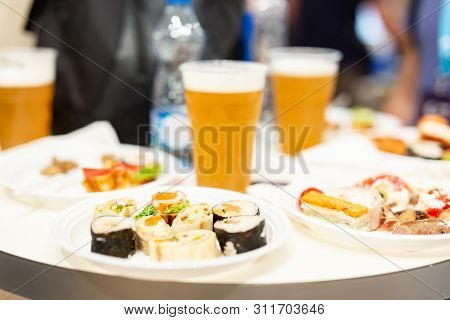 Close Up Of Food And Beer On Table. Snack Buffet Catering Concept.