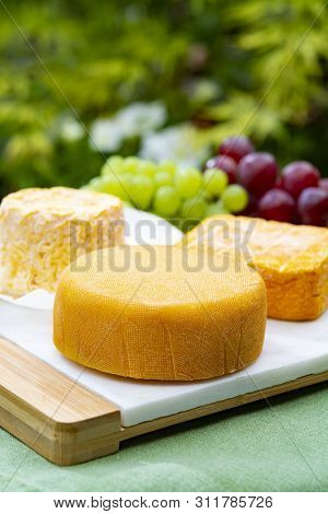 French Cheeses Collection, Riche De Saveurs, Langres And Le Peche Des Bons Peres Cheeses Served On W