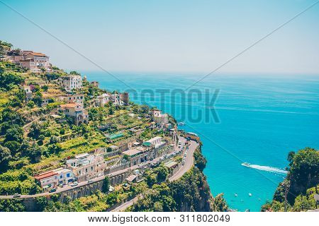 Beautiful Cozy Bay With Boats And Clear Turquoise Water In Italy