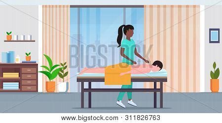 African American Acupuncturist Holding Needle Man Patient Getting Acupuncture Treatment Treatments A