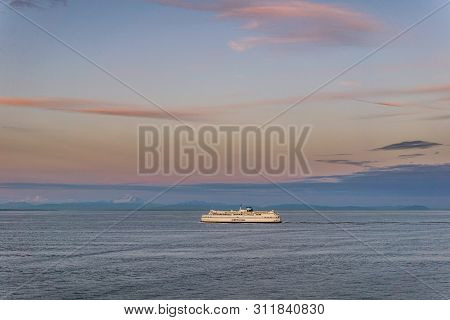 Delta, Canada - July 12, 2019: Bcferries Boat In Open Water Near Tsawwassen Ferry Terminal Sunset Ri