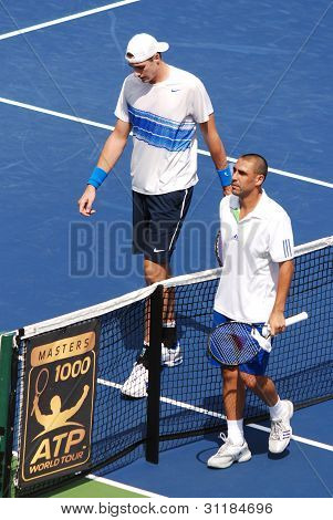 John Isner and Marcos Baghdatis
