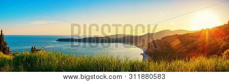Panoramic View From Above To The Adriatic Sea Coastline With Jaz Beach At Sunset Time, Montenegro.