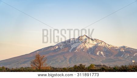 Mount Iwaki On Sun Set Time, A Stratovolcano Located In Western Aomori Prefecture, Tohoku, Japan. It