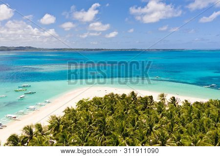 Seascape With A Beautiful Island. Daco Island, Philippines. Tropical Island With A White Sandy Beach