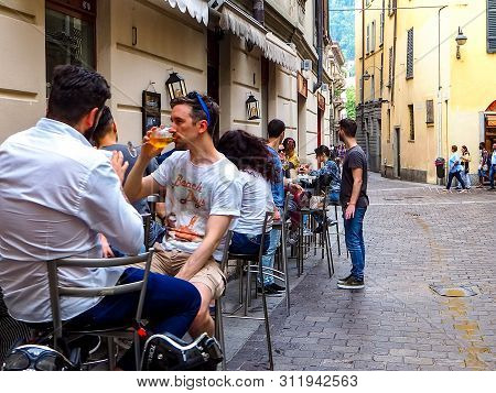 Como, Italy - May, 2018: People On A Cozy Streets Of Como City