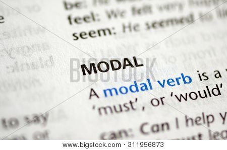 Montreal, Canada - July 17, 2019: Word Modal In A Dictionay With Meaning. Close-up And Selective Foc