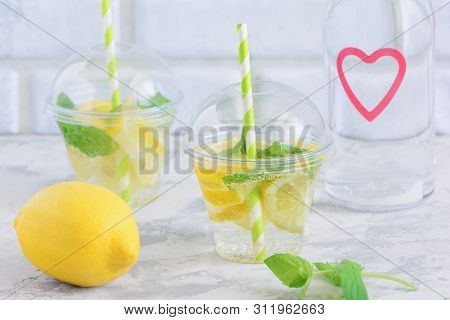 Cool Water With Lemon Mint Leaf Detox Beverage. Weight Loss Nutrition. Homemade Organic Lemonade In 