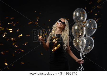Brightfull Expressions Of Happy Emotions Of Amazing Blonde Girl Celebrating Party On Black Backgroun
