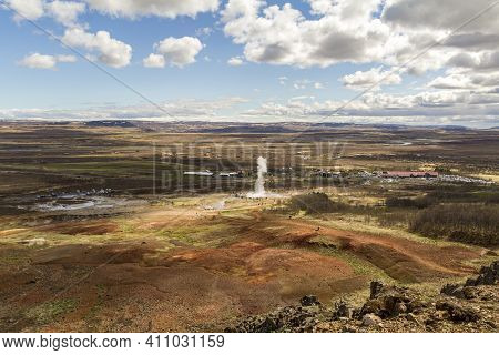 View On Geyser Valley, Haukadalur Geyser Erupting
