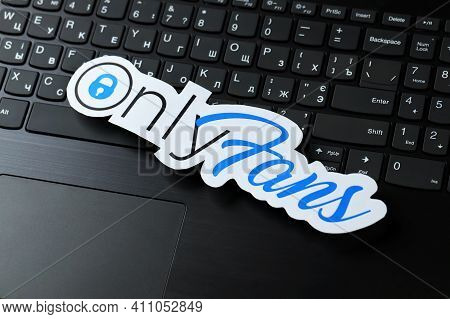 Kharkov, Ukraine - February 14, 2021: Onlyfans Paper Logo On Black Laptop Keyboard. Onlyfans Is Cont