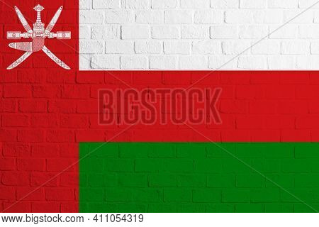 Flag Of Oman. Brick Wall Texture Of The Flag Of Oman.