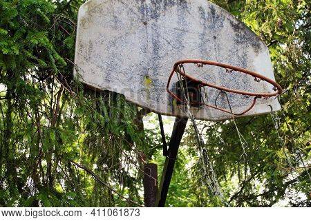 Very Old Abandoned Basketball Hoop That Is Falling Apart