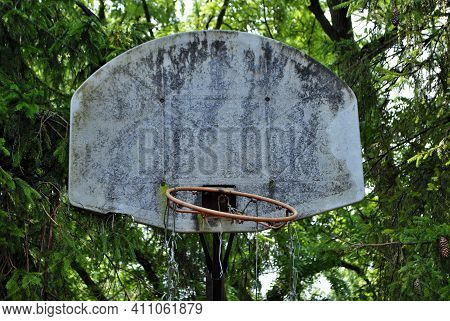 Very Old Abandoned Basketball Hoop That Is Falling Apart