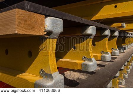 Stacked Formwork Made Of Yellow Wooden Beams And Plywood Sheets Using For Concrete Cast In Place Wor