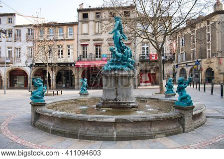 Limoux Aude France 03.04.21 Deserted Market Place. Large Stone Circular Fountain. Copper Blue Green 