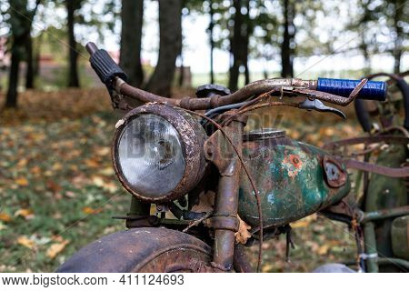 Old, Rusty Soviet Motorcycle. Old Tansport. Collectible Rusty Motorcycle.