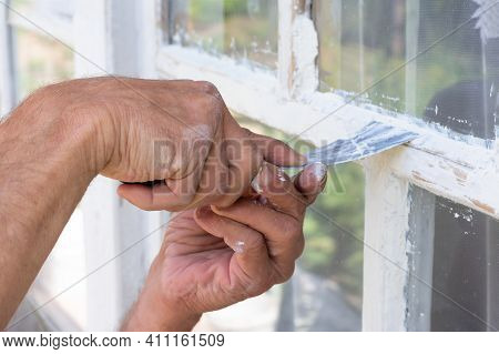 Close Up Male Hands Make Putty Works. Repairing Wooden Window For Protection, Warterproof. Countrysi