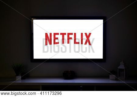 Rosario, Argentina - March 4, 2021: Netflix Logo On The Screen Of Lcd Smart Tv In The Middle Of A Li