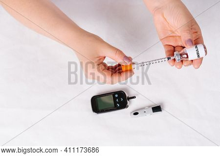 Insulin Syringe For Administering Insulin To Diabetic Patients On White Background. Diabetes Treatme