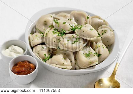 Boiled Or Steamed Pelmeni In White Bowl. Pelmeni Are Homemade Pasta With Mince Meet Filling Wrapped 