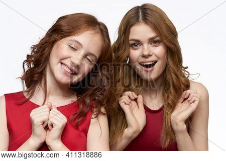 Cheerful Mom And Daughter Hugs Joy Lifestyle Family Light Background