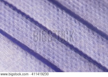 Super Macro Image Showing The Surface Texture Of A 3 Ply Single Use Face Mask. Medical Mask With 3 F