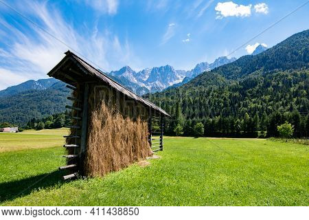 Kozolec - Slovenian Typical Hayrack With Beautiful Panorama Of Julian Alpes, Slovenia