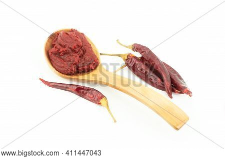 Traditional Turkish Chili Pepper Paste In Spoon With Dried Peppers Isolated On White Background
