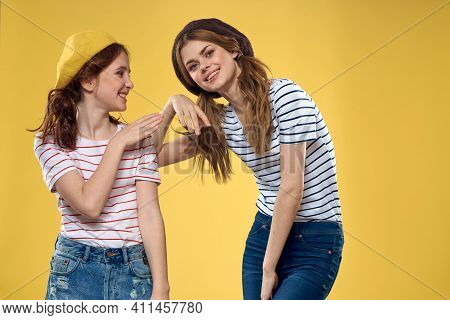 Funny Mom And Daughter Wearing Hats Fashion Fun Joy Family Yellow Background