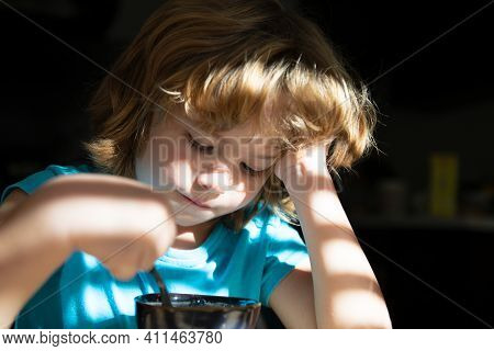 Kids Food Concept. Child Having Breakfast At Home. Healthy Homefood. Boy Eats At Kitchen