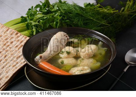 Chicken Matzo Ball Soup With Carrots In The Bowl. Jewish Traditional Passover Holiday Food