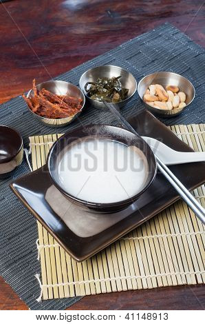 congee with dried beef, peanuts, preserve turnips and sea weeds