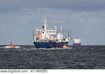 Merchant Vessel  - The Freighter Follows Waterway