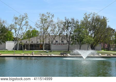 IRVINE, CA - MARCH 24, 2017: Heritage Park Fine Arts Center. The park features, pools, sports fields, Mulit-use buildings, lawns, pond, amphitheater, and more.