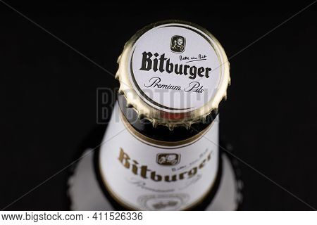 Lviv, Ukraine - May 08, 2020: Bitburger German Beer Cap And Bottle