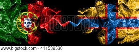 Portugal, Portuguese Vs Ingrian People Smoky Mystic Flags Placed Side By Side. Thick Colored Silky A