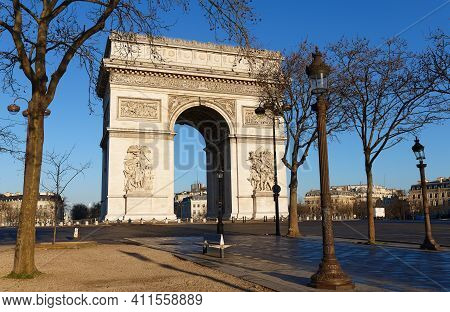 The Triumphal Arch In Sunny Day, Paris, France.