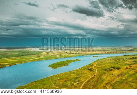 Rechytsa, Gomel Region, Belarus. Aerial View Of Dnieper River. Sky Above Green Meadow And River Land