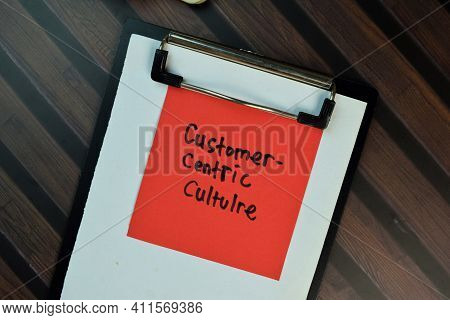 Customer Centric Culture Write On Sticky Notes Isolated On Wooden Table.