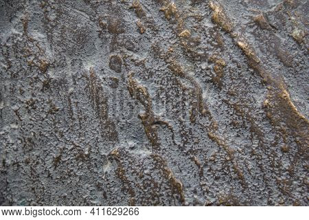 Metal Texture. Close-up Of The Rough Texture Of A Large Rock. Metal Surface For Natural Background. 