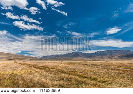 Mountain Landscape With Beautiful Sky And Clouds. Plateau Ukok, Altai